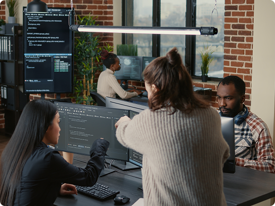 image of developers collaborating in their workspace