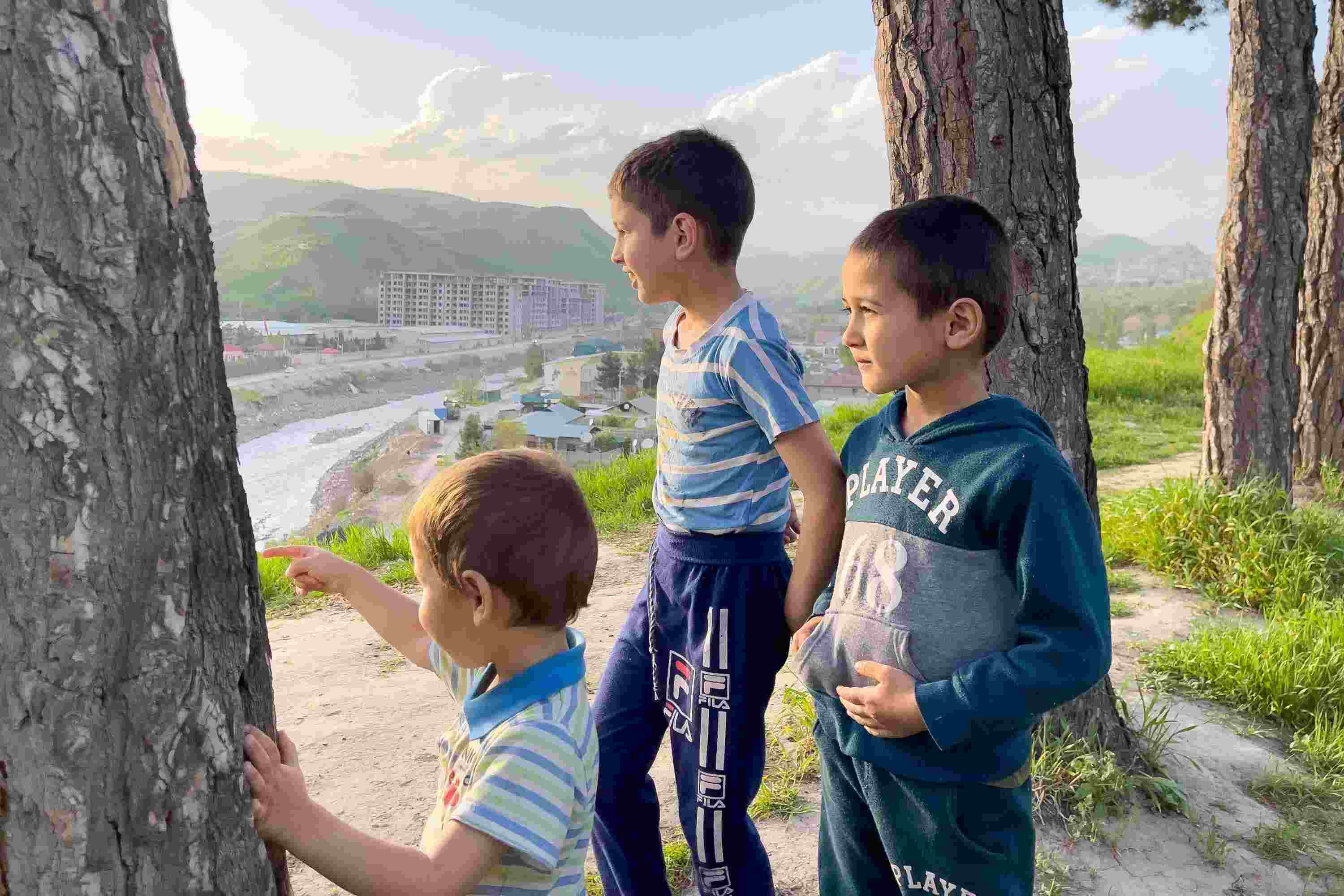 Three boys look over Dushanbe, Tadjikistan