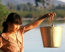 girl holding a water bucket