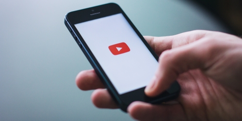 smartphone with youtube logo displayed
